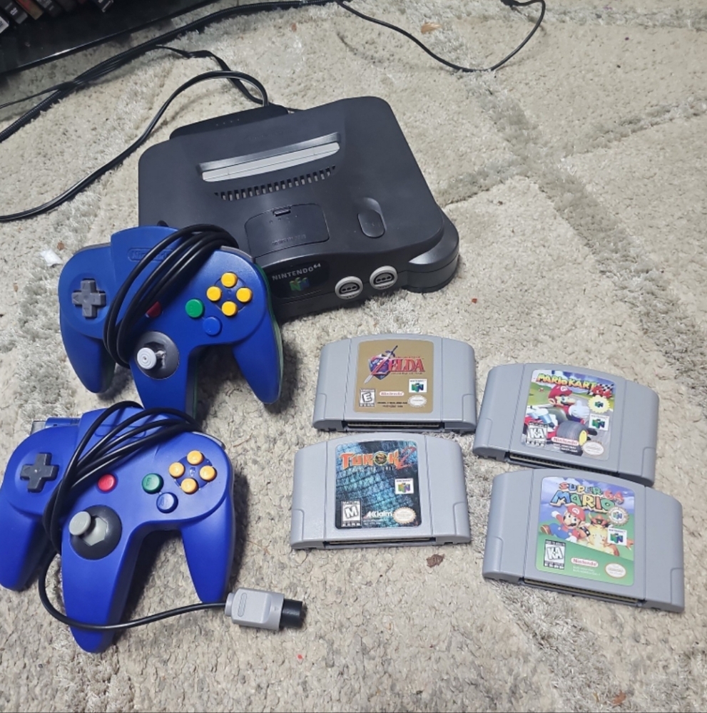 Nintendo 64 with 4 games